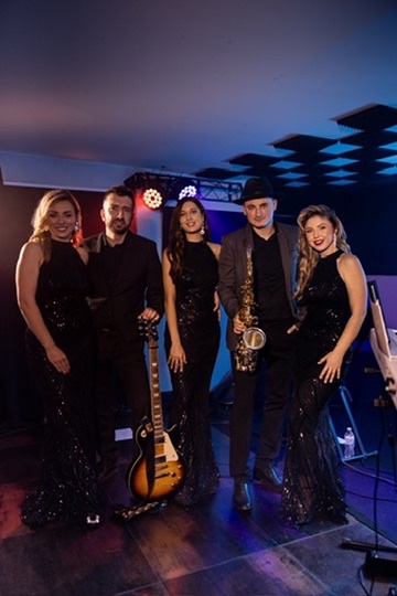 Yuliia performing with other musicians