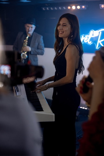 Yuliia performing with other musicians